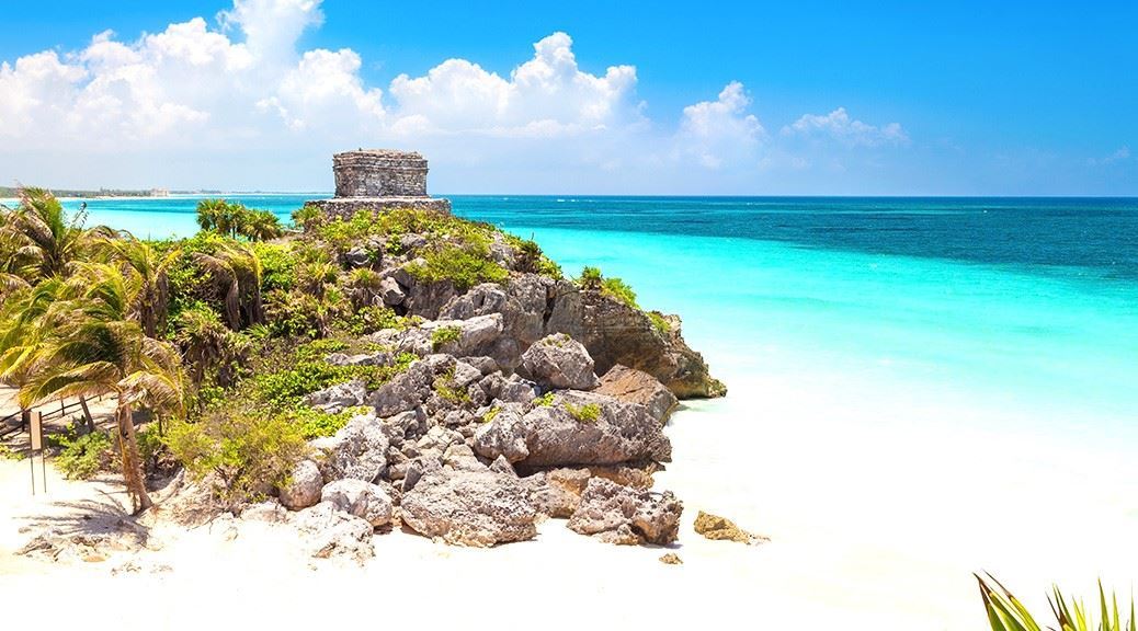 Ancient Mayan ruins God of Winds Temple on turquoise Caribbean sea in Tulum